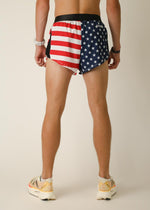 Man wearing ChicknLegs USA flag pattern split running shorts from behind