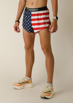 Man wearing ChicknLegs American flag print running shorts with split sides