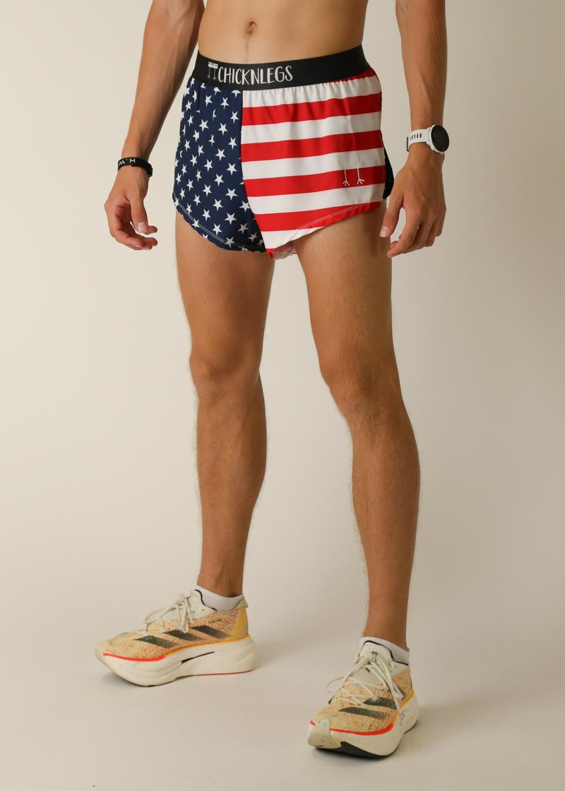 Man wearing ChicknLegs American flag print running shorts with split sides