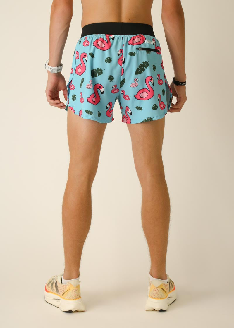 Men's light blue running shorts with pink flamingo and tropical leaf pattern