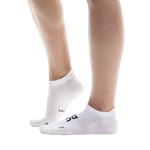 On Core Run Sock Low 2P in white shown on model's feet