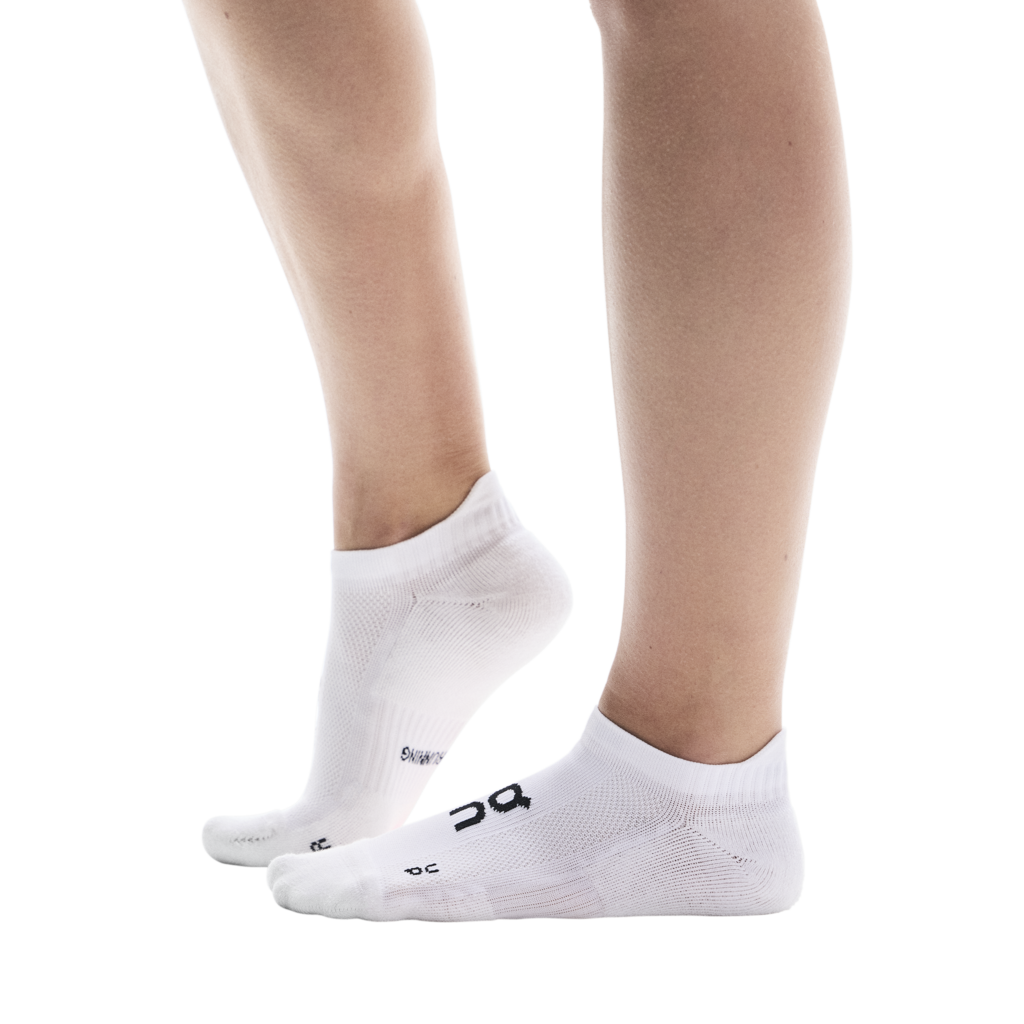On Core Run Sock Low 2P in white shown on model's feet