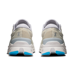 On Cloudstratus 3 women's running shoes in cream colorway with blue sole accents