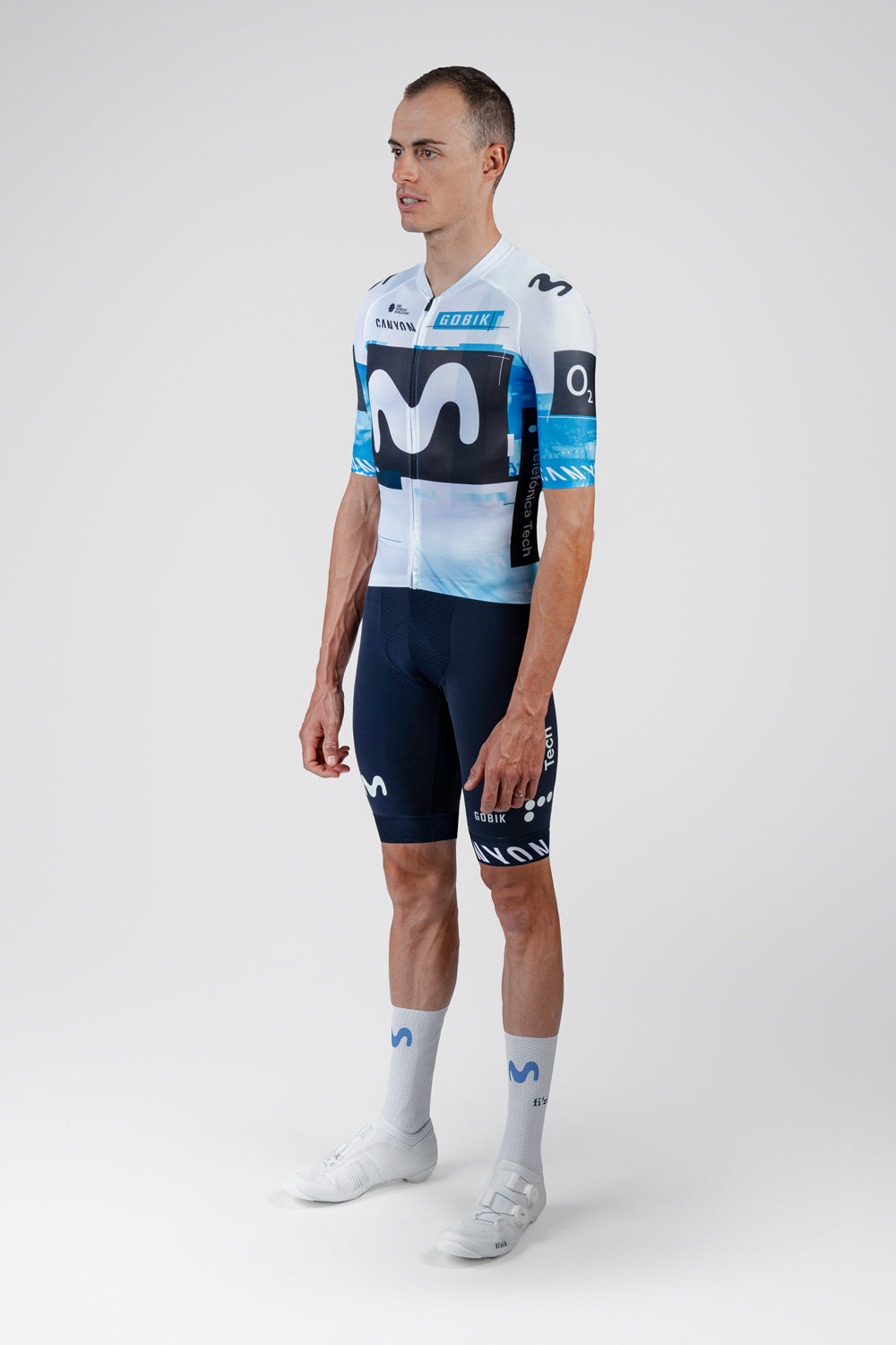 Professional cyclist wearing Gobik Movistar Team cycling jersey and bib shorts