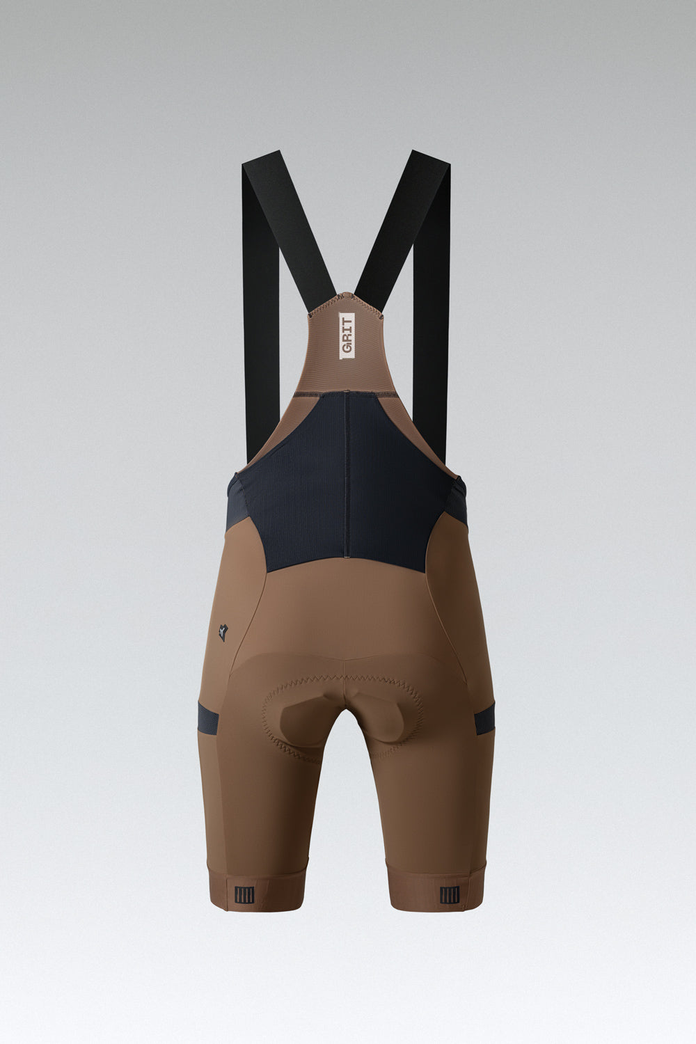 Gobik Grit men's cycling bib shorts in toffee brown with navy accents and suspenders