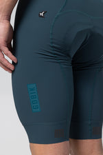 Gobik Matt 2.0 bib shorts in dark teal showing detailed construction and branding