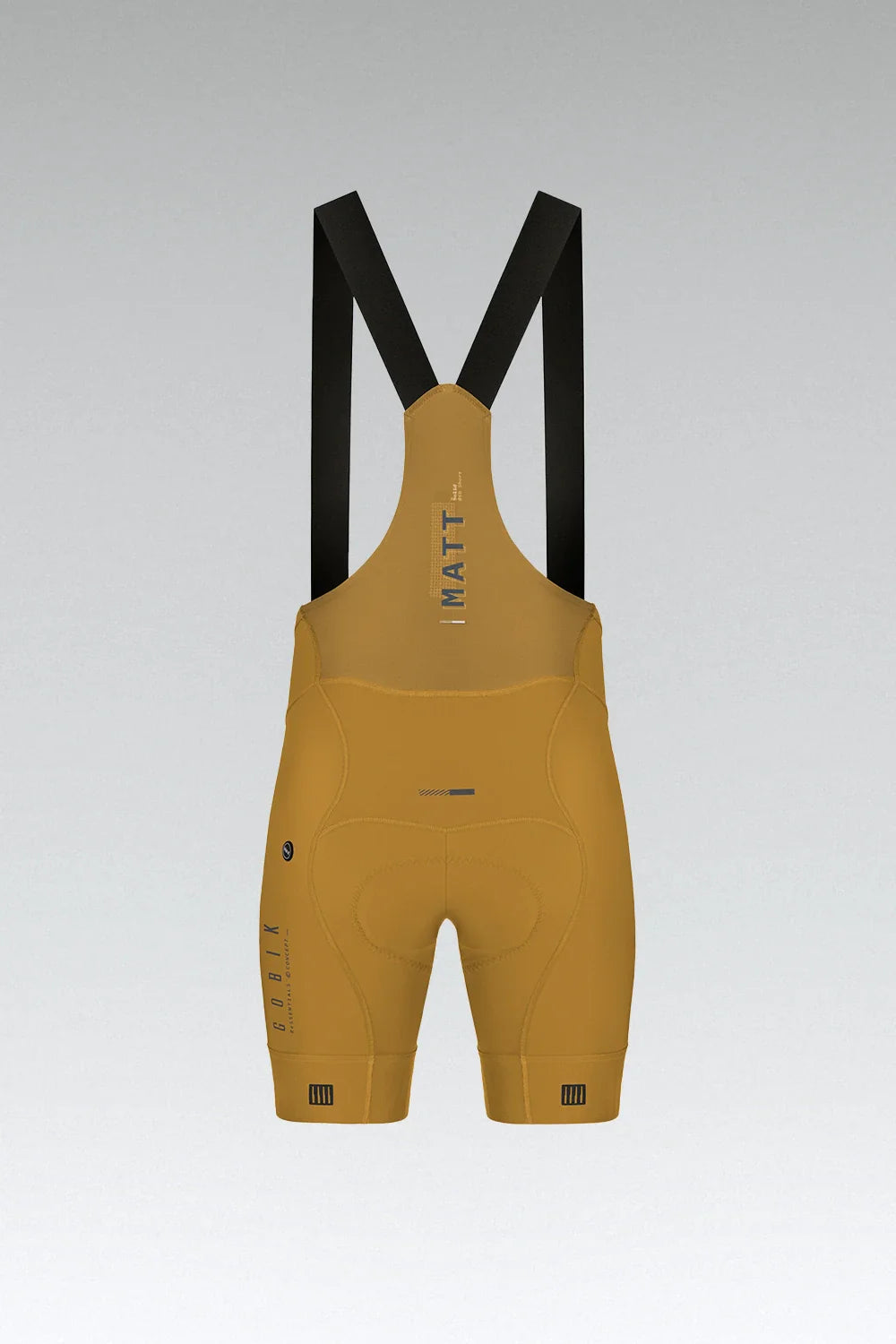 Gobik Matt Compact Men's Bibshorts in Turmeric yellow with black straps on studio background