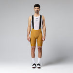 Gobik Matt Compact Men's Bibshort in Turmeric with white mesh base layer