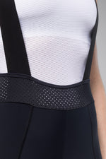 Close-up of black Gobik women's cycling bib shorts with white mesh back