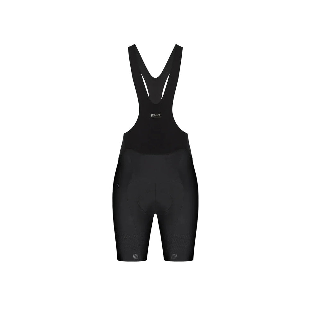 Black Gobik Ultralite women's cycling bib shorts with suspender straps on gray background