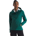 Woman wearing green The North Face Venture 2 jacket with hood