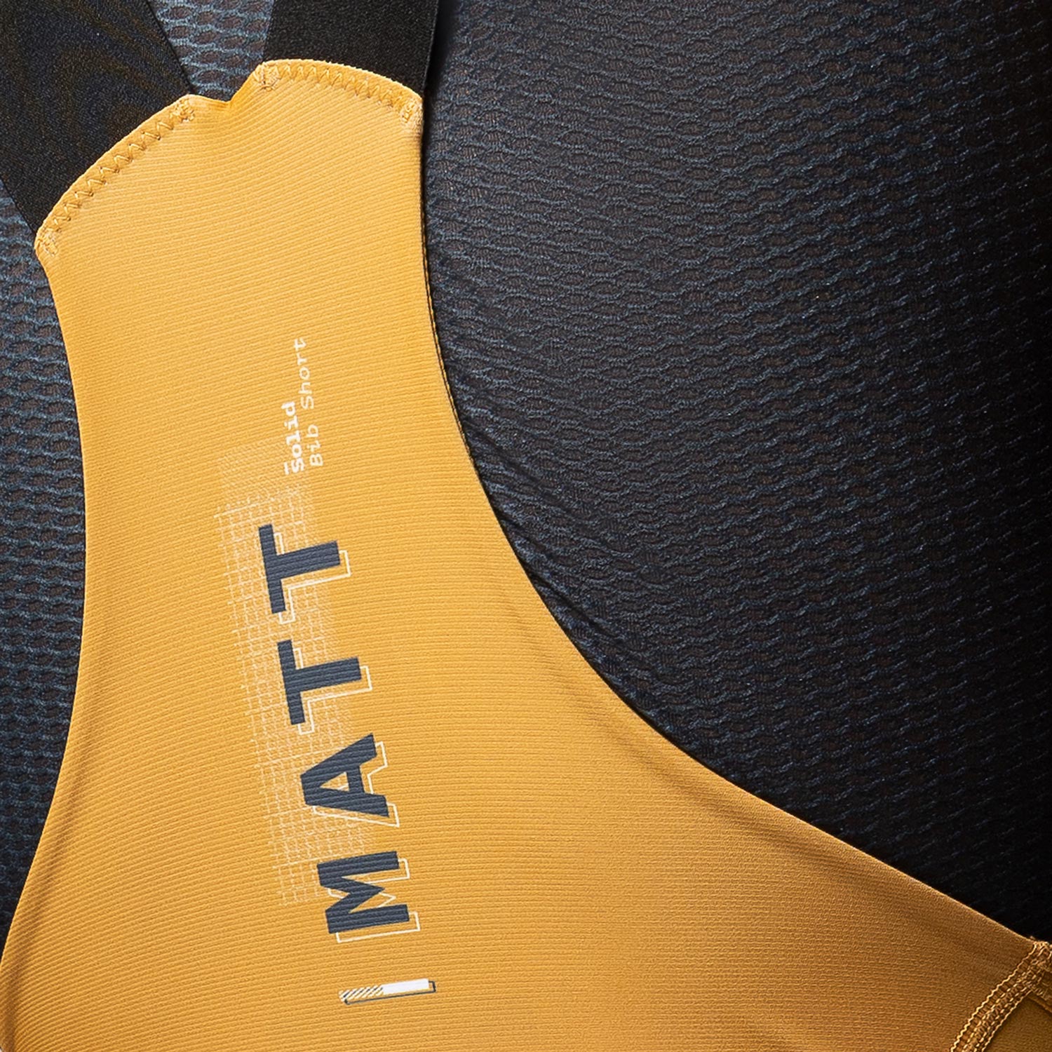 Gobik Matt Compact men's bibshort in turmeric yellow showing leg band detail