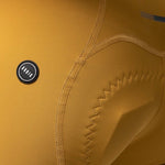 Gobik Matt Compact Men's Bibshort in turmeric showing design details and stitching
