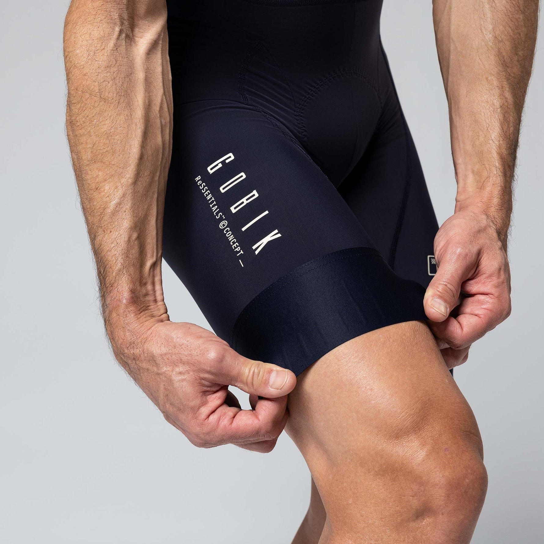 Gobik Matt Compact Men's Bibshort in Ultrablue showing leg gripper detail and brand logo
