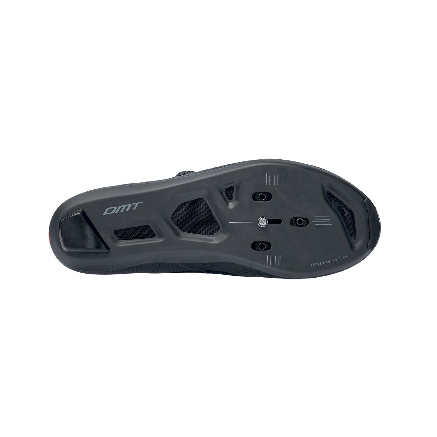 DMT cycling shoe sole showing black carbon fiber construction and cleat mounting holes
