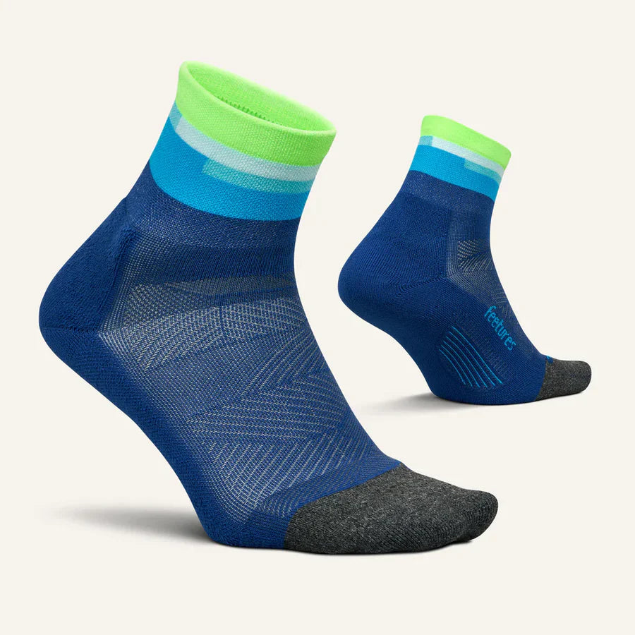 Feetures Elite Ultra Light Quarter socks in blue with colorful striped cuffs