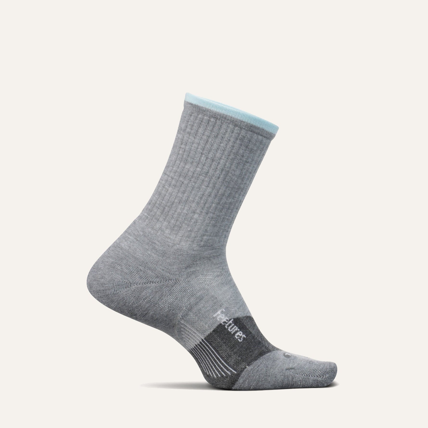 Feetures Trail Max Cushion Mini Crew sock in charcoal gray with blue cuff