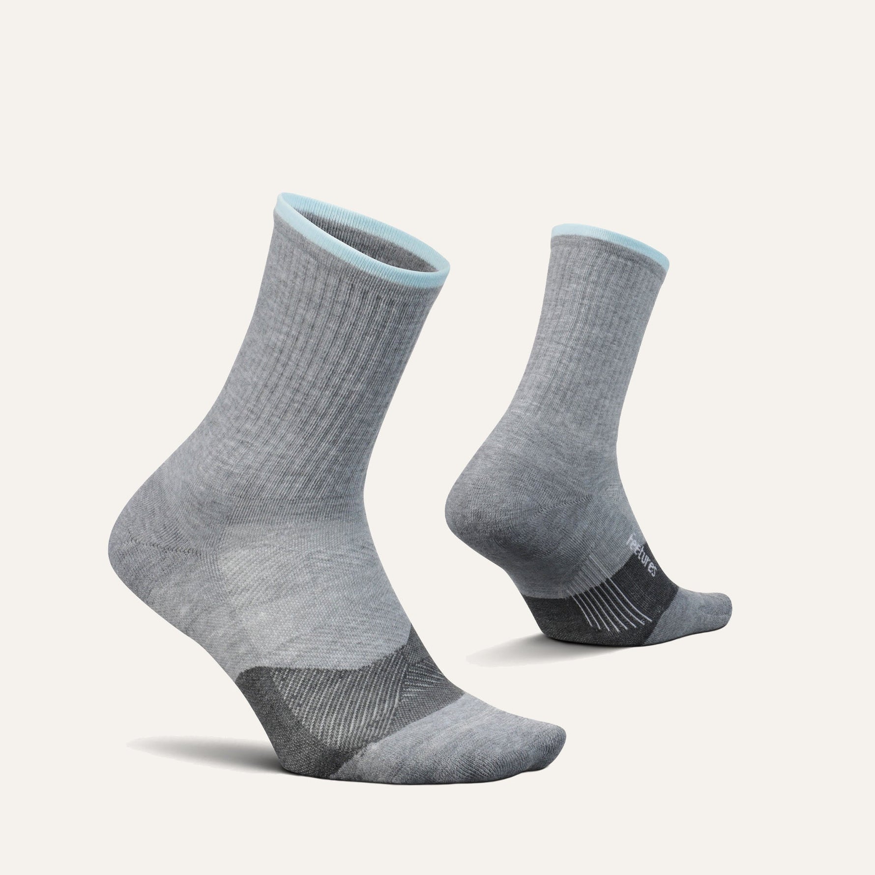 Feetures Trail Max Cushion Mini Crew socks in charcoal gray with blue trim