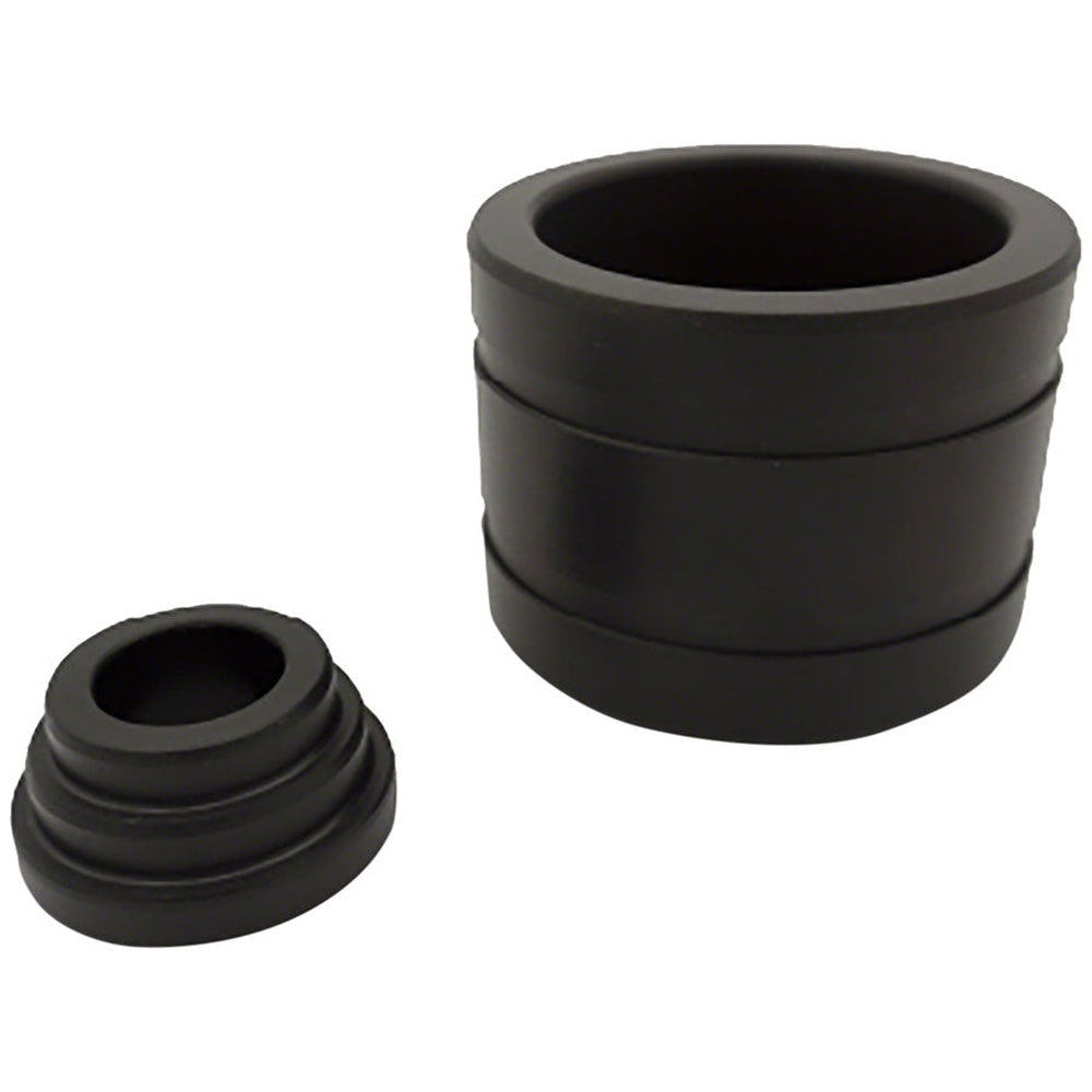 Black MAHLE bottom bracket removal tool with cylindrical design on white background