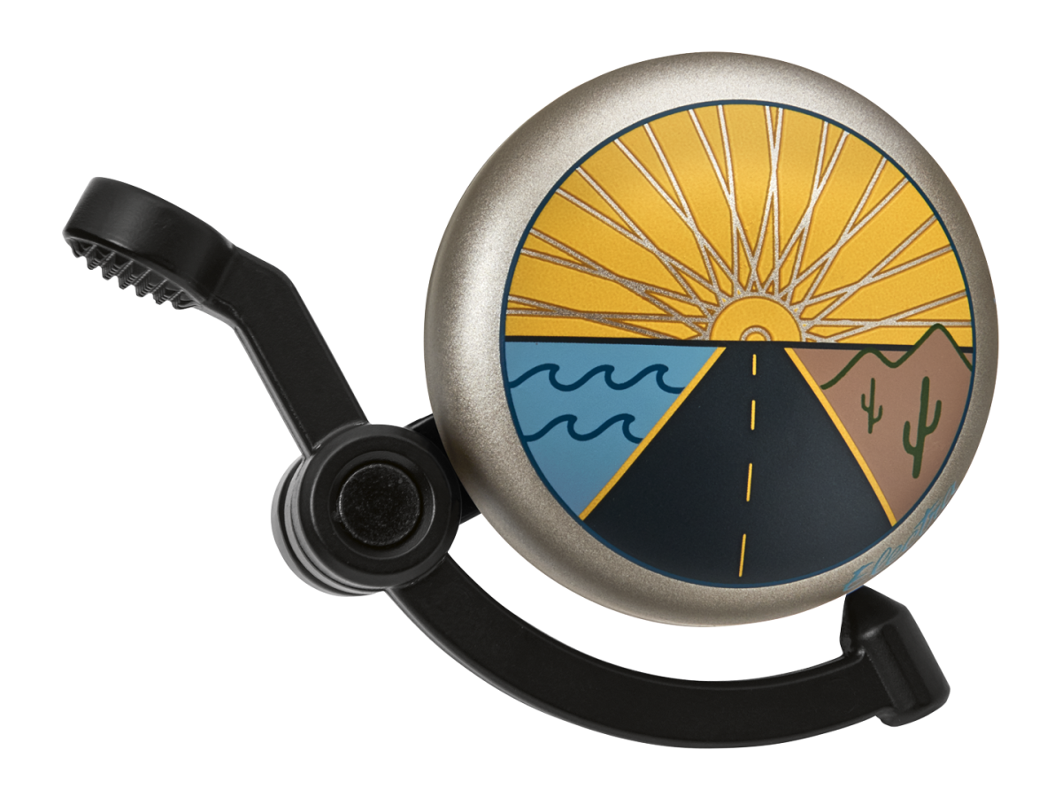 Electra bicycle bell with Linear Horizon design featuring sun rays, road, and landscape graphics