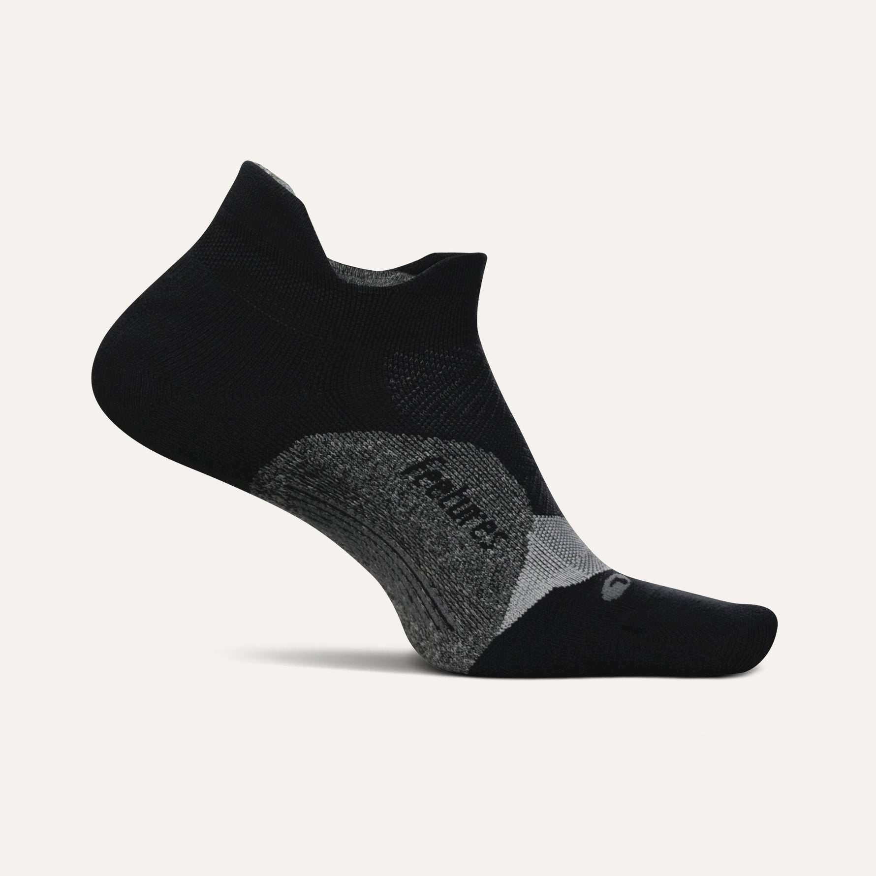 Black Feetures Elite Light Cushion Tab athletic running sock with gray gradient design