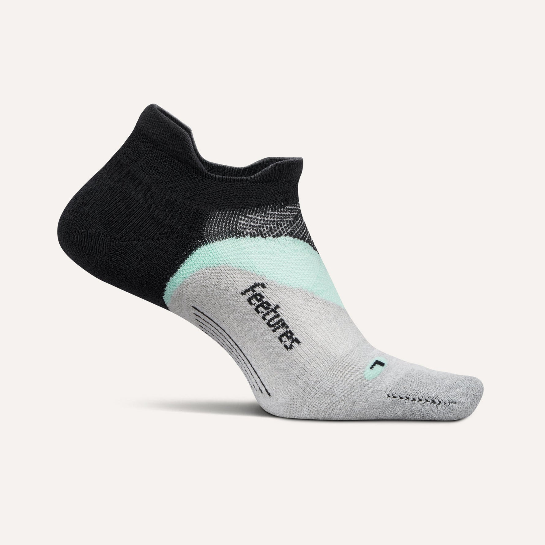 Feetures Elite Light Cushion Tab sock in black with mint and white accents