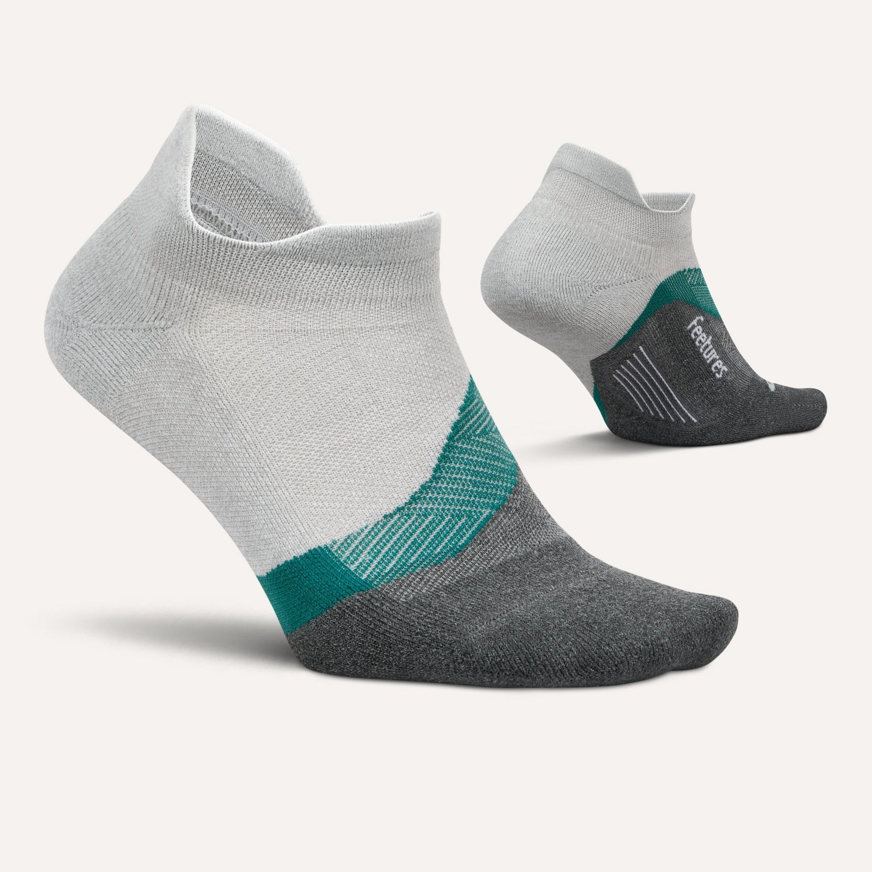 Feetures Elite Light Cushion Tab running socks in grey with teal accents