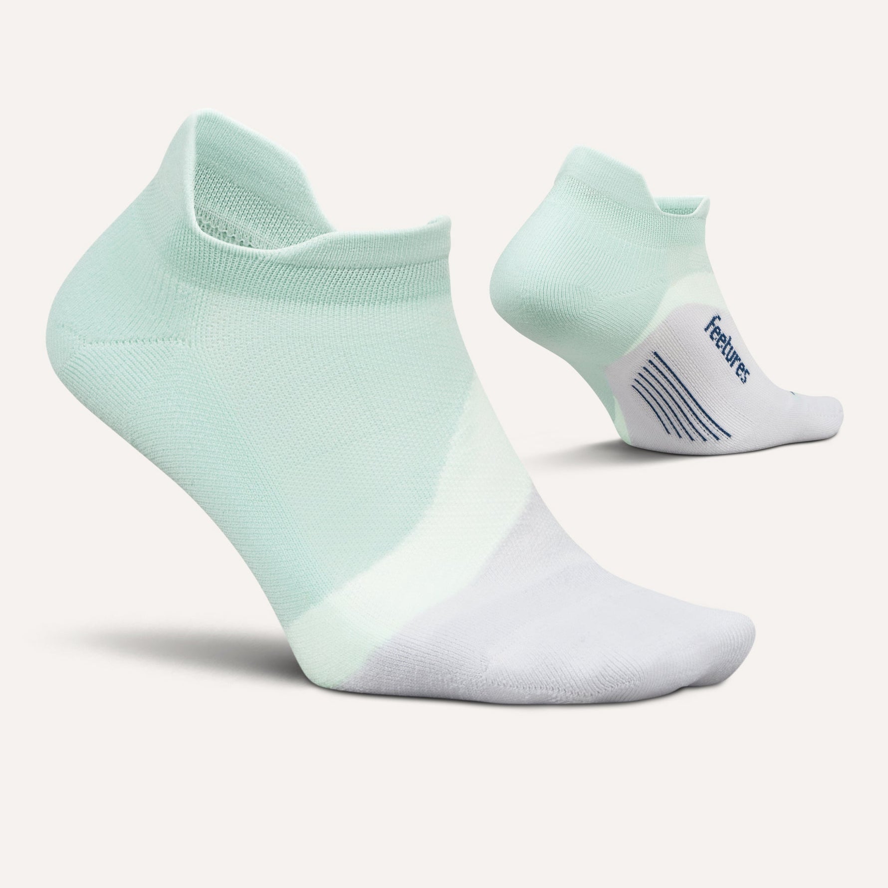 Feetures Elite Light Cushion Tab running socks in mint green and white