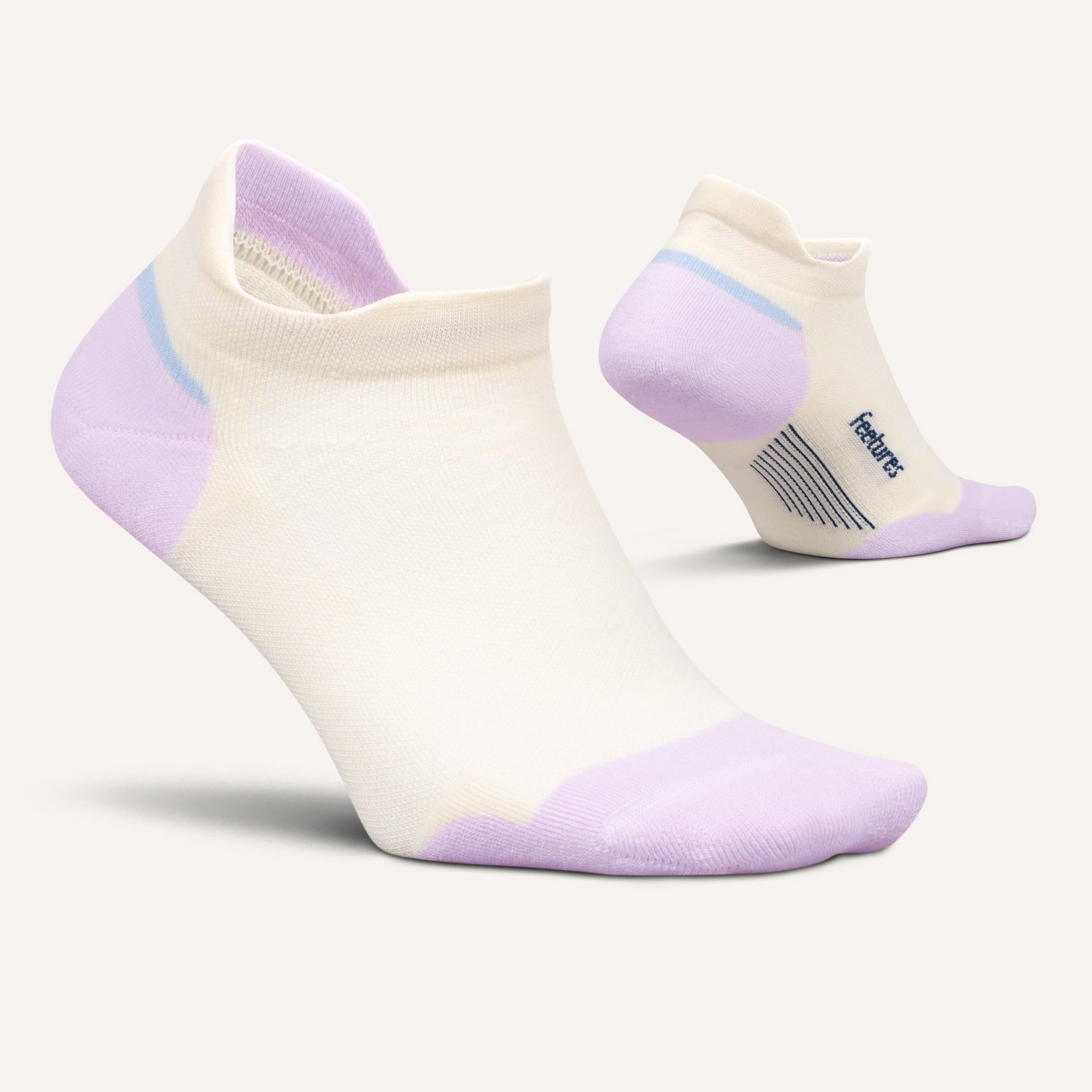 Feetures Elite Max Cushion Tab socks in white with purple heel and toe