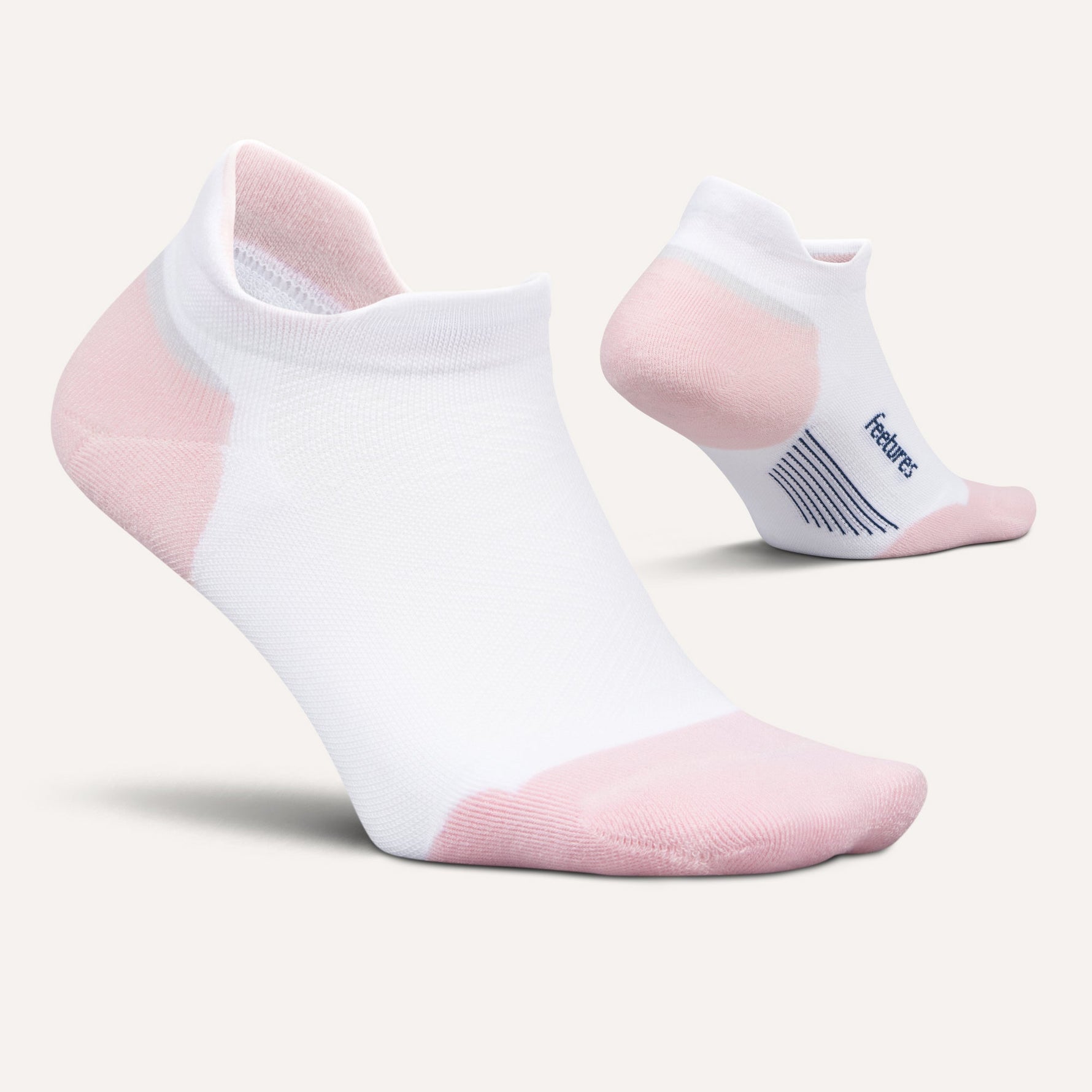 Feetures Elite Max Cushion Tab socks in white with pink heel and toe
