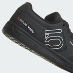 Five Ten Freerider Pro MTB shoes in black with white accents on gray background