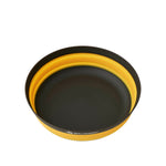 Sea To Summit collapsible yellow bowl with black interior showing nesting design
