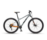 GT Avalanche Sport mountain bike in gunmetal gray with orange accents on white background