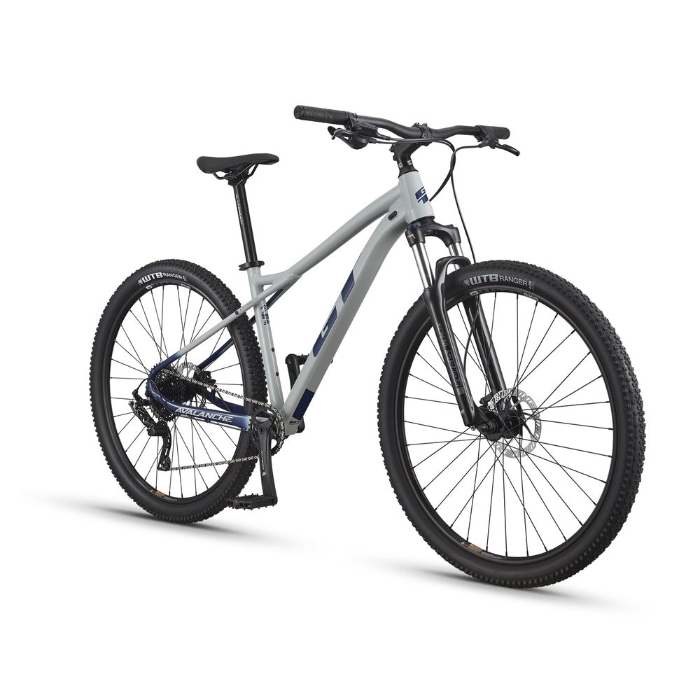 GT Avalanche mountain bike in light gray with blue accents on white background