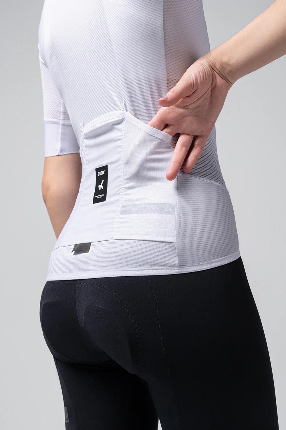 GOBIK Carrera 2.0 Unisex Jersey in Chalk showing rear pocket detail and fit