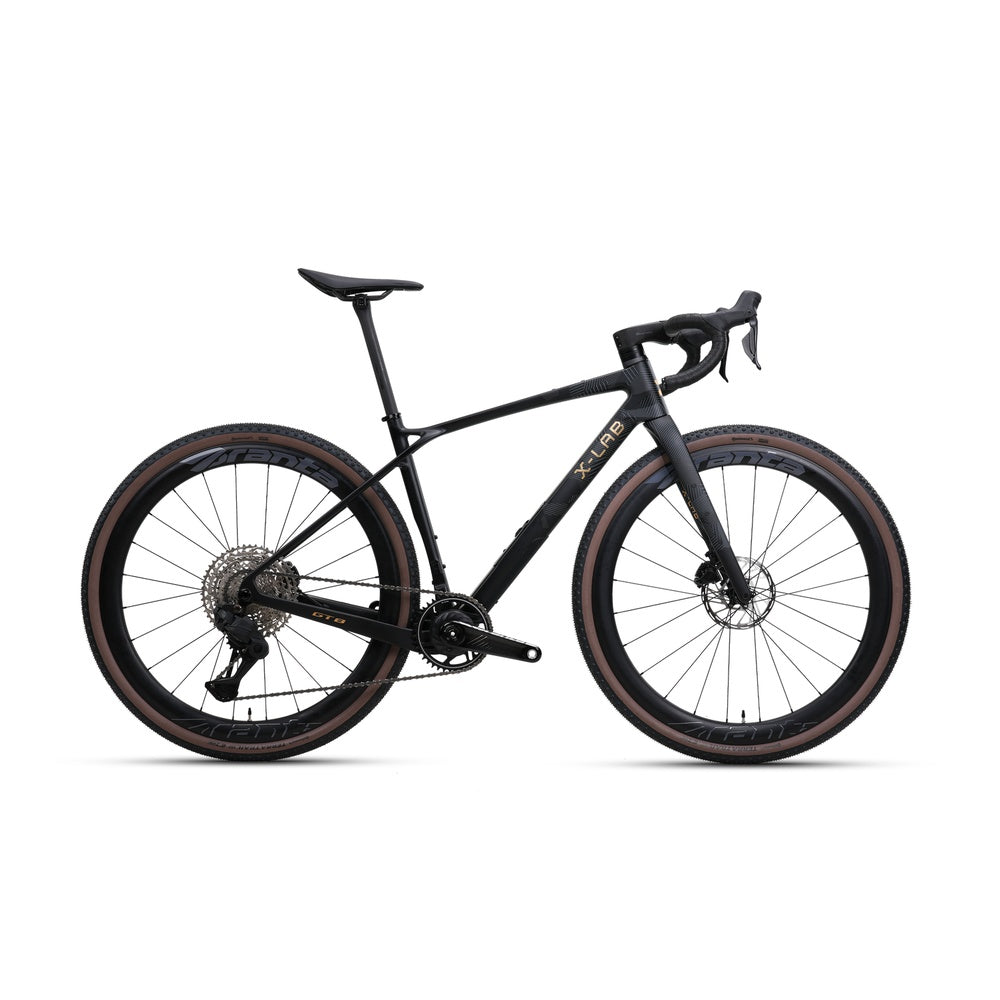 X-LAB GT8 gravel bike in Afterburner Black with tan sidewall tires, side profile view
