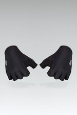 Black cycling gloves with textured grip pattern displayed on gray background