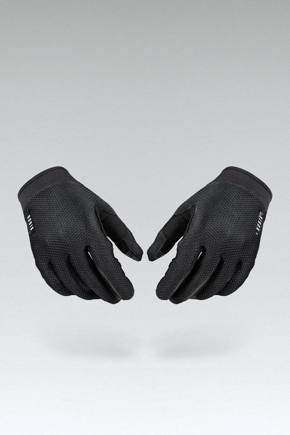 Gobik Lynx black cycling gloves with textured grip palms displayed on gray background