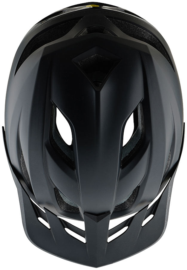 Troy Lee Designs Flowline SE stealth black helmet, top-down view showing ventilation channels