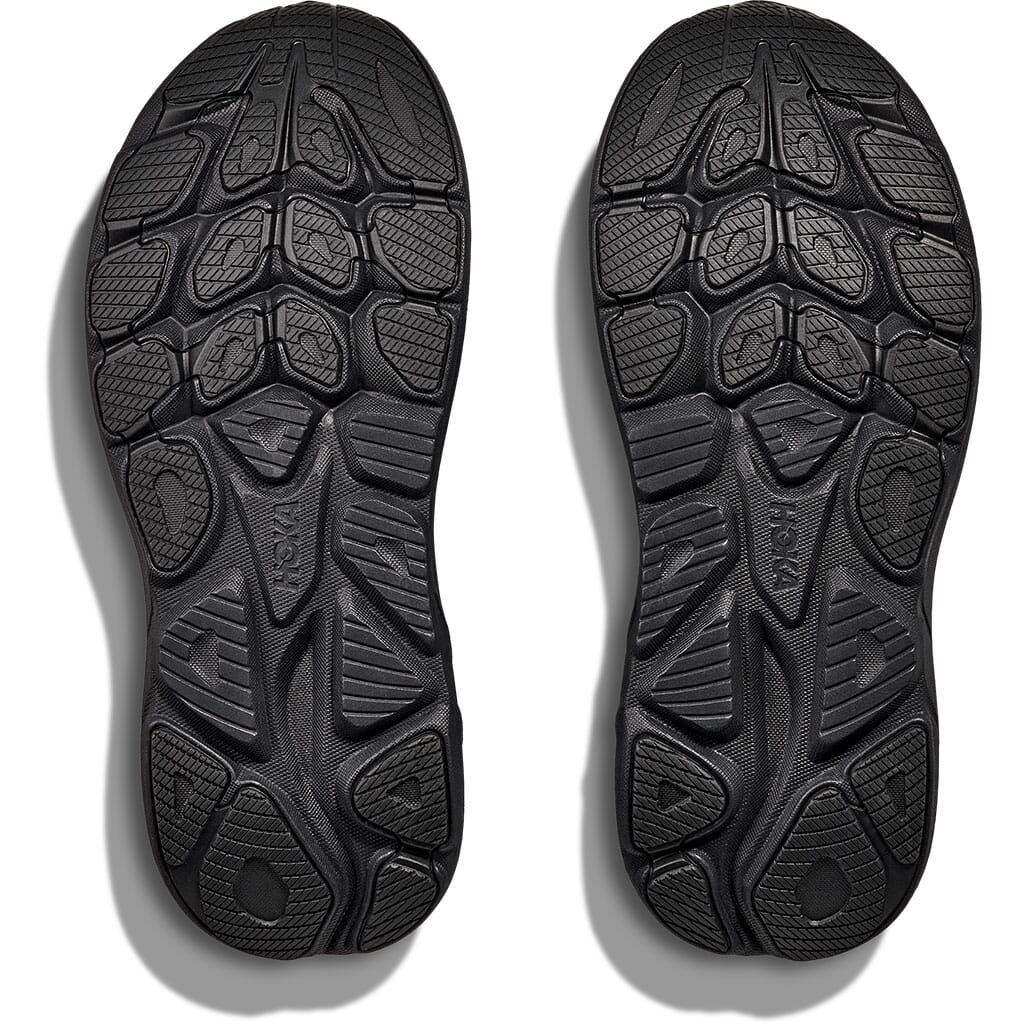 Hoka Clifton 10 Women's outsole view showing black rubber tread pattern on both shoes