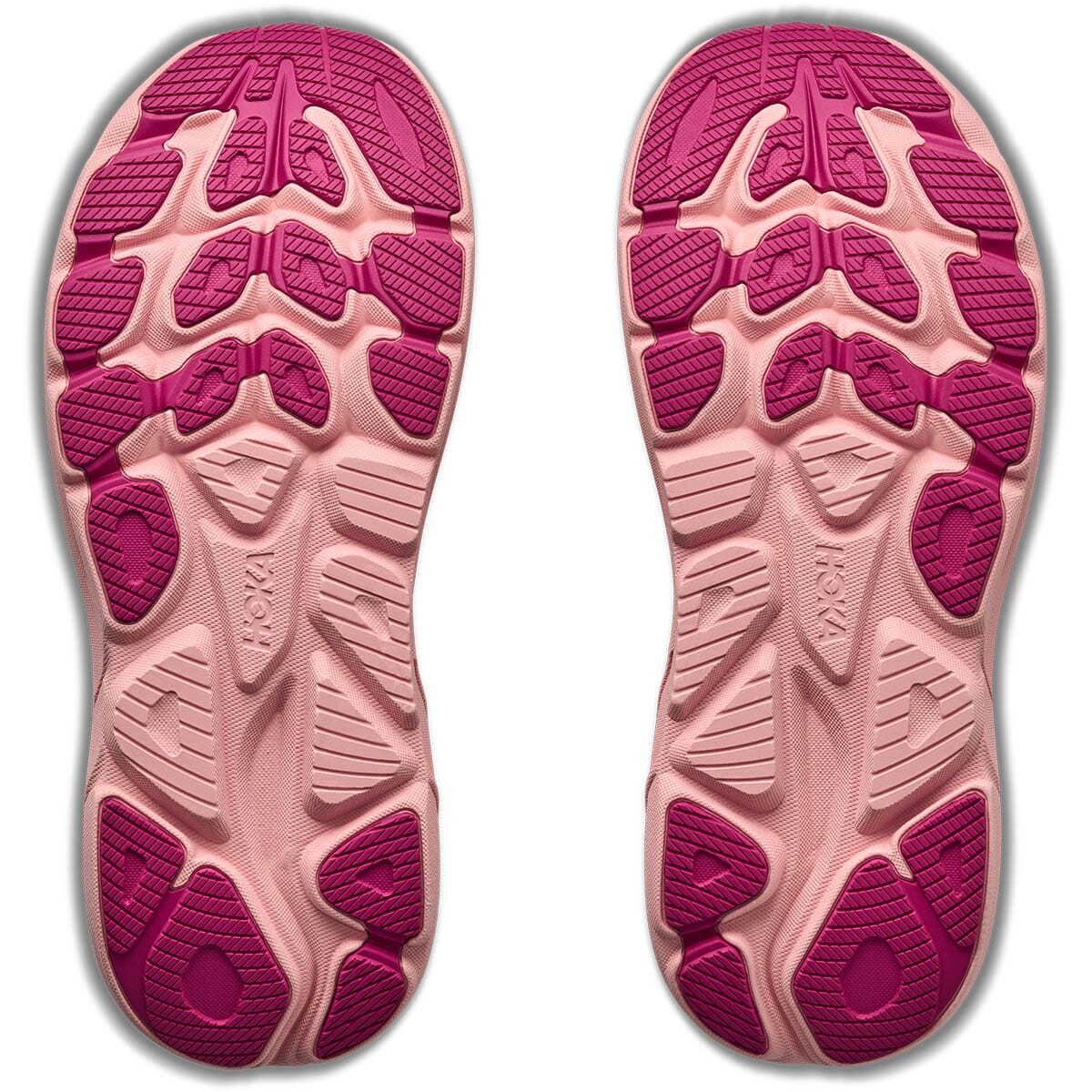 Hoka Clifton 11 outsole view showing pink and magenta rubber traction pattern, both shoes