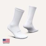 Feetures High Performance Max Cushion Crew socks in white, front and back view