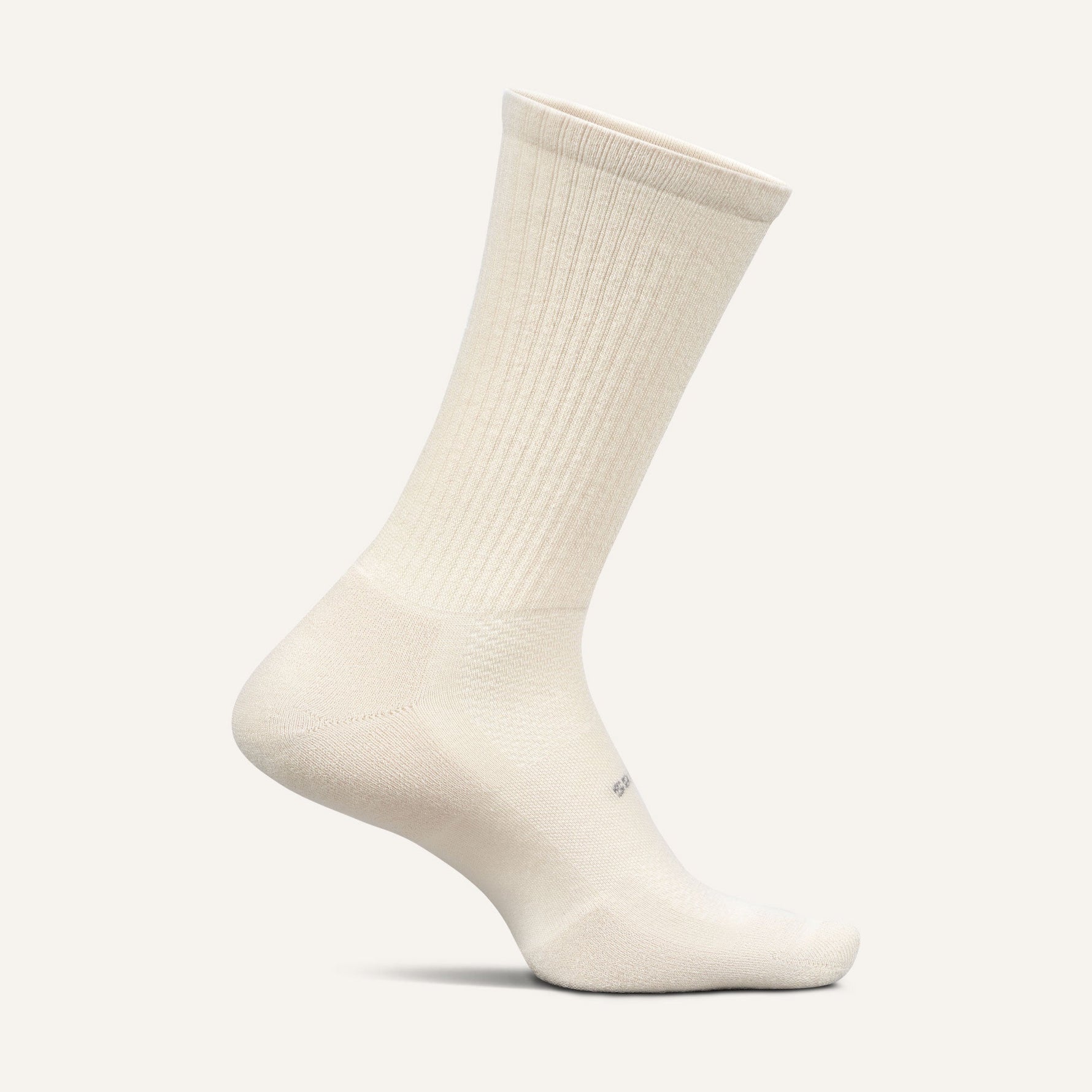 Feetures High Performance Max Cushion Crew sock in off-white cream color, side view