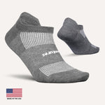 Feetures grey athletic no-show socks with white mesh ventilation panels and branding