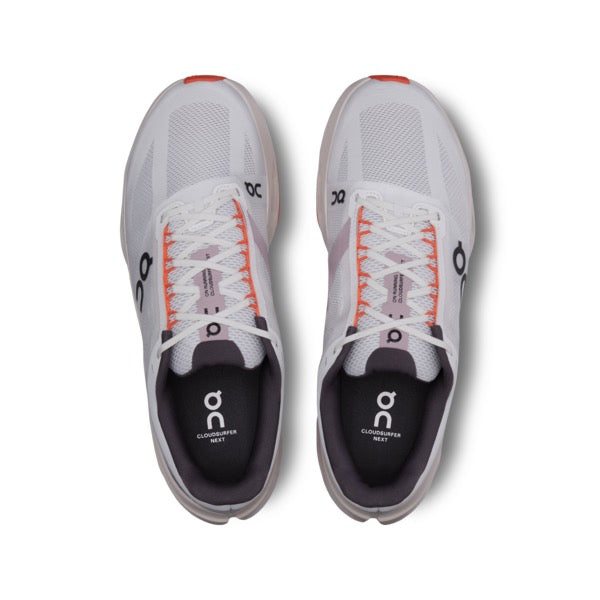 On Cloudsurfer Next men's running shoes in white with orange flame accents, top view