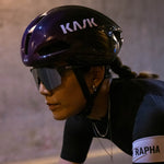 KASK Nirvana helmet in ultraviolet color worn by cyclist in aerodynamic position