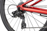 Close-up of Shimano Tourney rear derailleur and cassette on Cannondale Kids Quick C2 metallic red bike