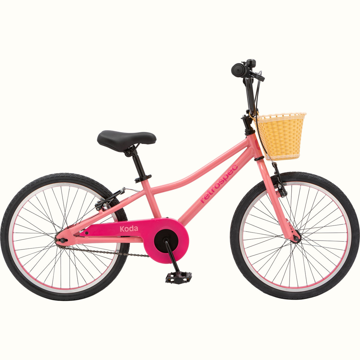 Retrospec Koda 20-inch kids bike in cotton candy pink with front wicker basket