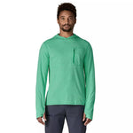 Man wearing bright green hooded long-sleeve shirt with chest pocket