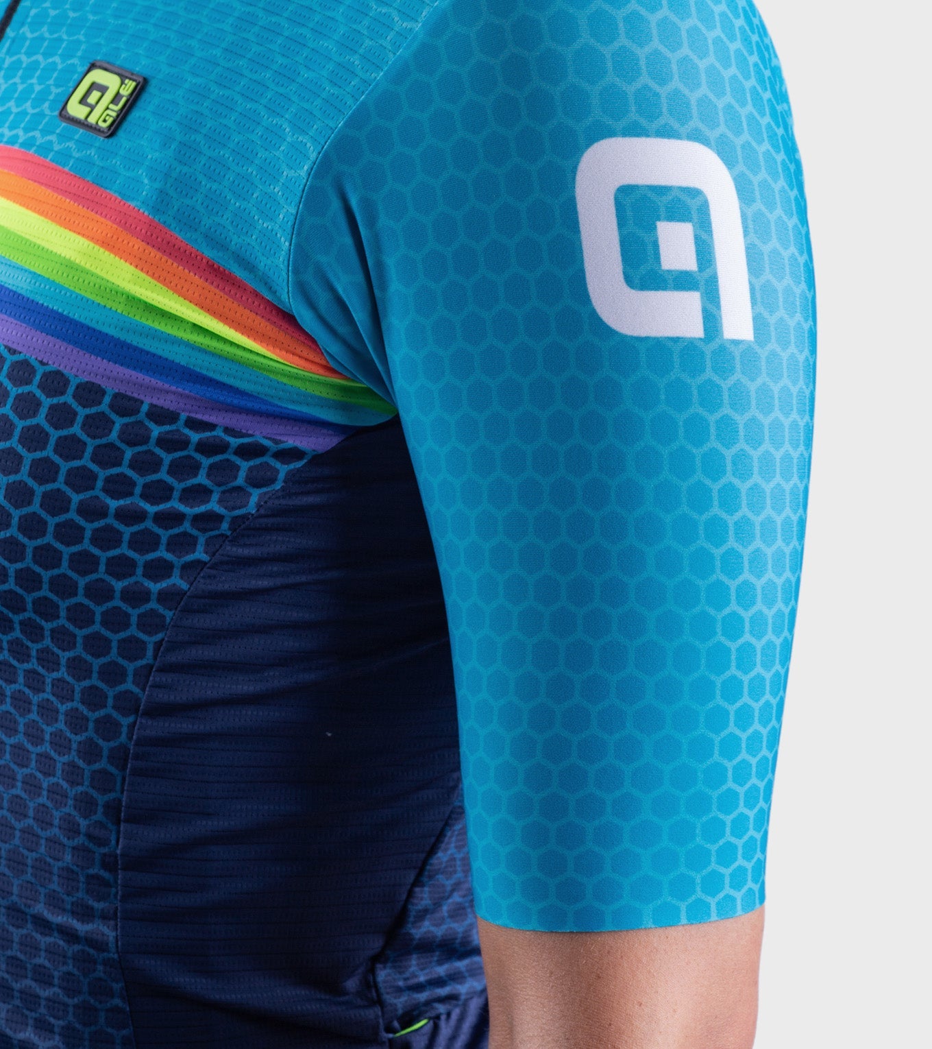 ALE cycling jersey in light blue with hexagonal pattern and rainbow stripe